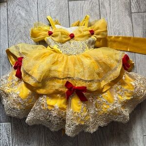 Belle- Bitty Bundles of joy.                          Yellow and Red Lace Dress